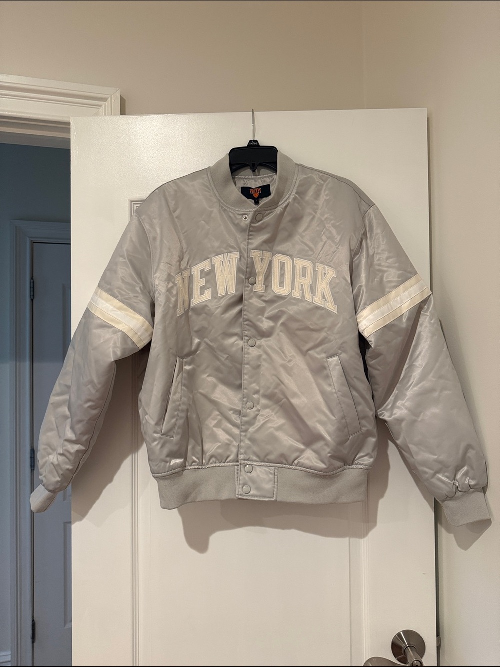Kith x Knicks empire satin bomber jacket.